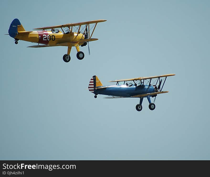 2 Biplanes Flying