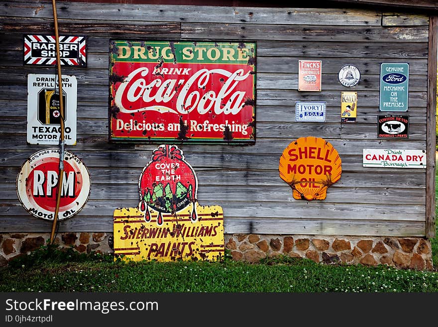 Drug Store Drink Coca Cola Signage on Gray Wooden Wall