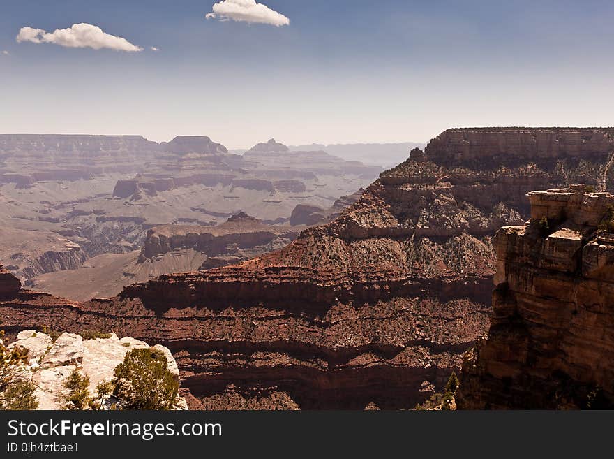 Grand Canyon Under Blue and White Cloudy Sky