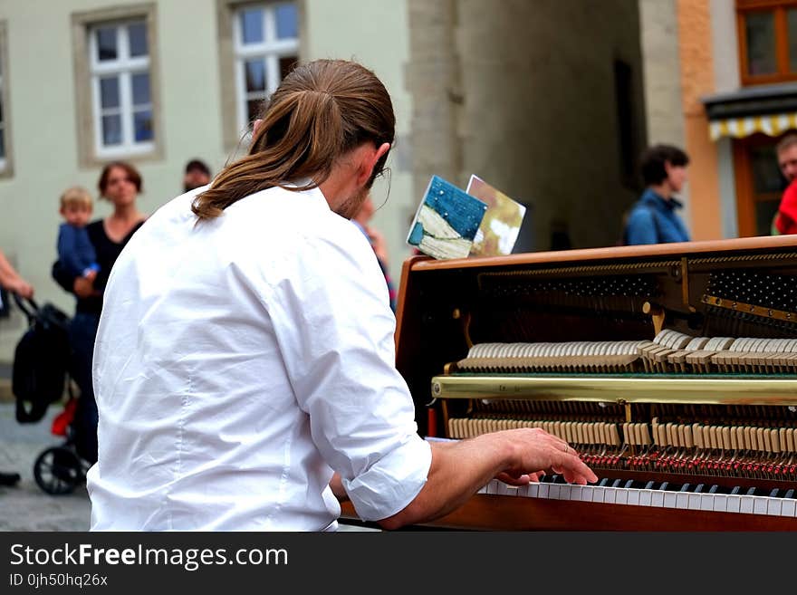 Man Playing Piano