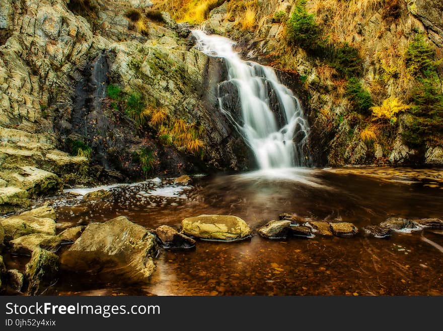 Green and Brown Waterfalls