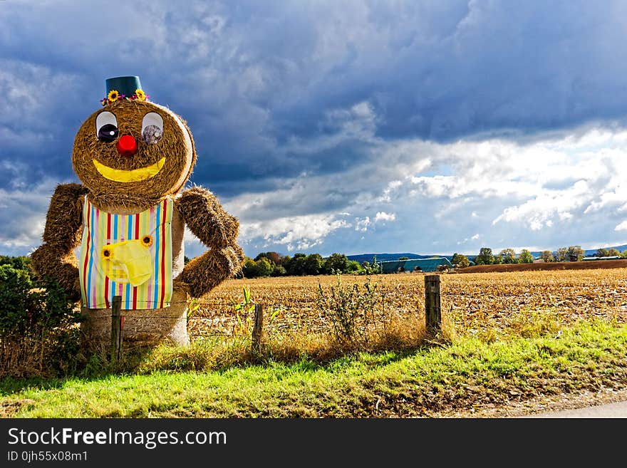 Ginger Bread Hay Themed Under Blue Cloudy Sky during Day Time