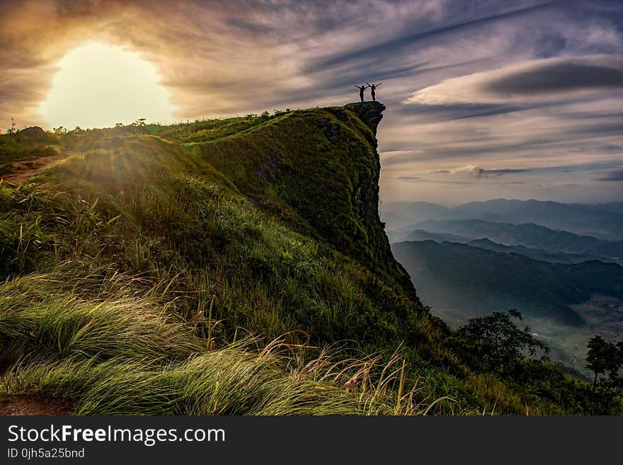 Scenic View of Landscape Against Sky during Sunset