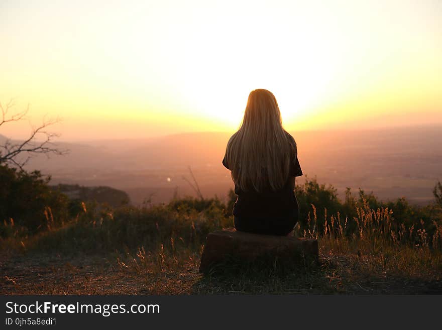 Woman Looking at Sunset