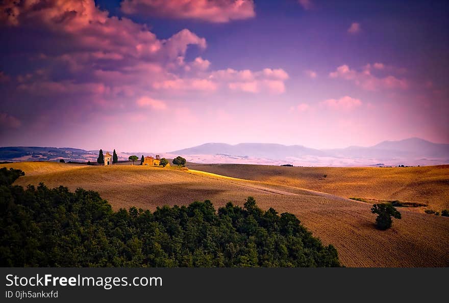 Scenic View of Landscape Against Dramatic Sky