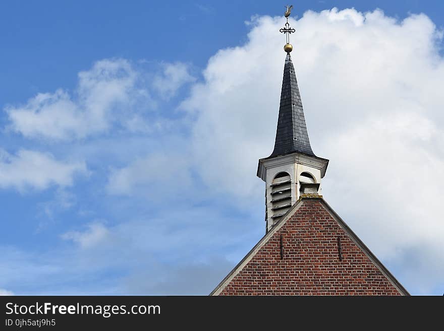 Low Angle View of Clock Against Sky