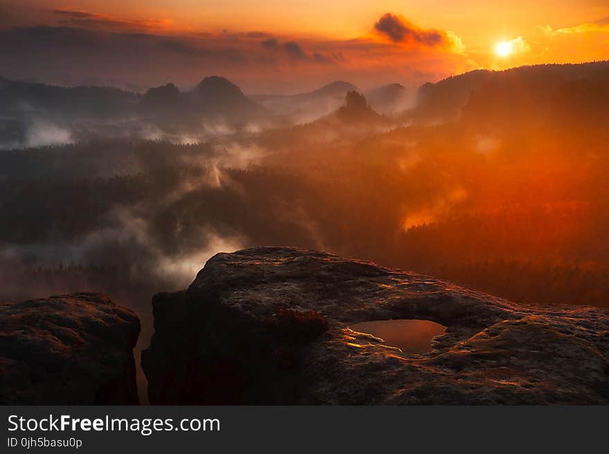 Scenic View of Mountains during Sunset