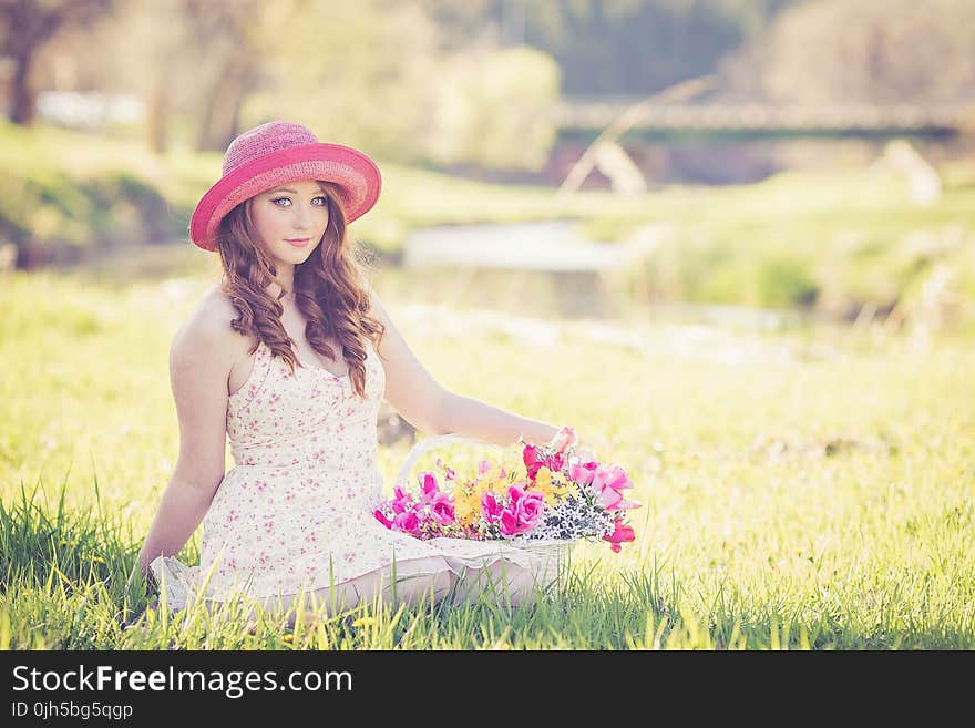 Portrait of a Beautiful Young Woman in Field