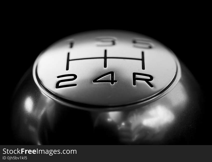 Close-up of Gear Shift over Black Background