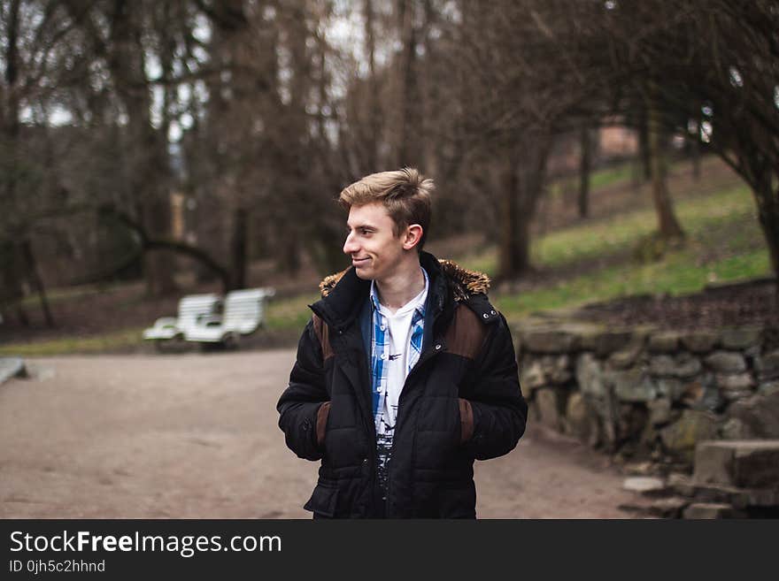 Photography of a Man Wearing Black and Brown Jacket