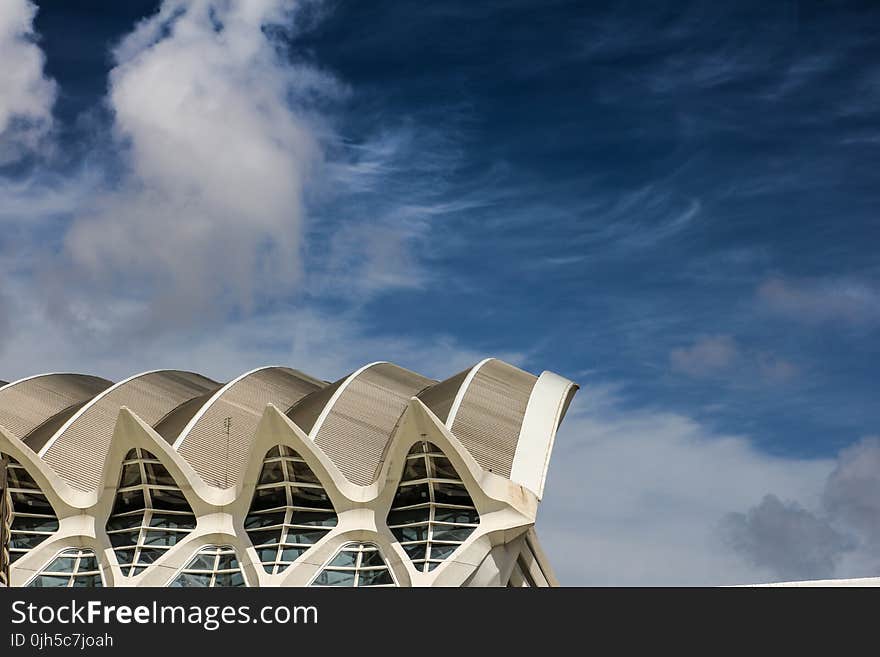 Low Angle View of Building Against Cloudy Sky