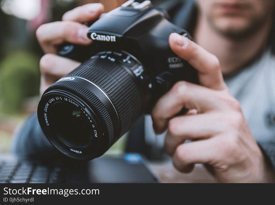 Close-up of Man Holding Camera