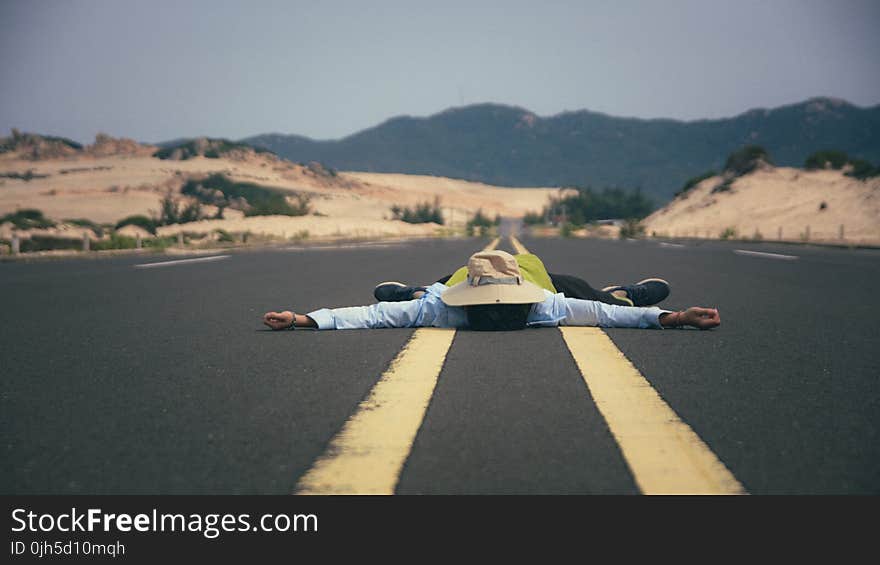 Man on Mountain Against Sky