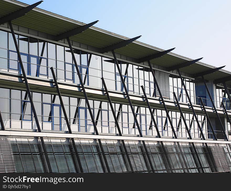 Low Angle View of Office Building Against Sky