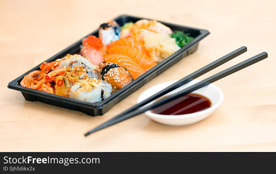 Close-up Photo of Sushi Served on Table