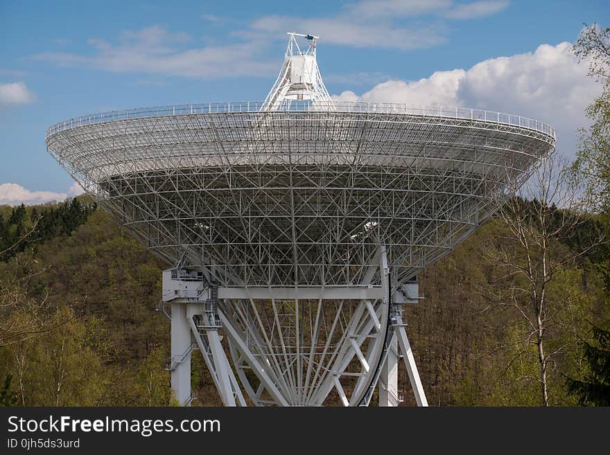 View of Communications Tower Against Cloudy Sky