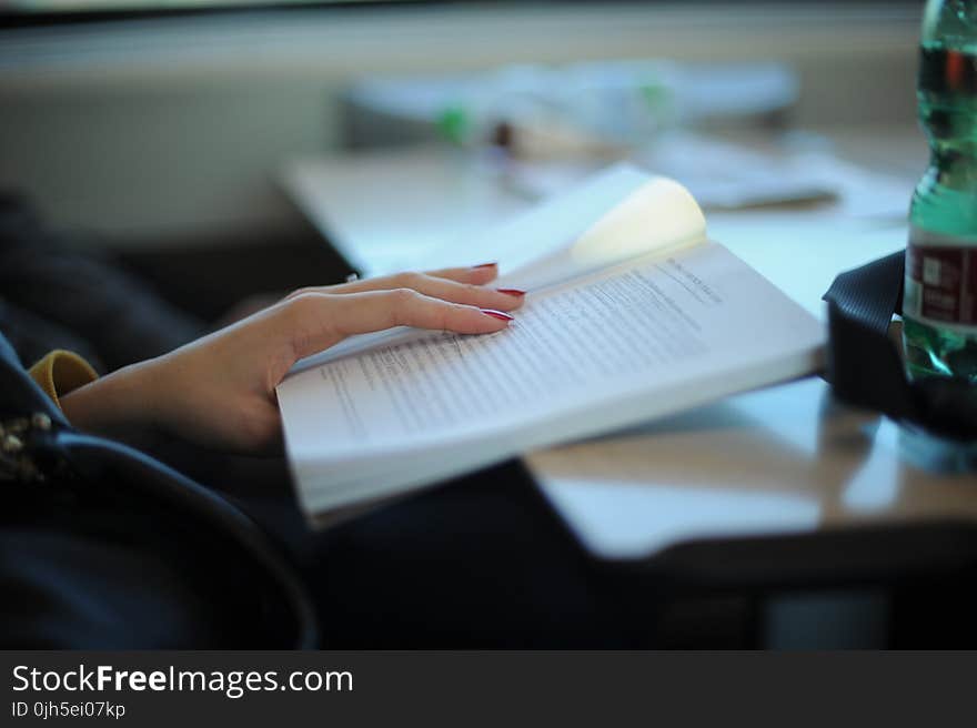 Woman Reading Her Notes