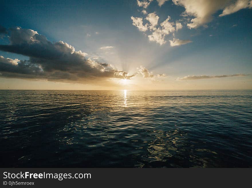 Scenic View of Sea at Sunset