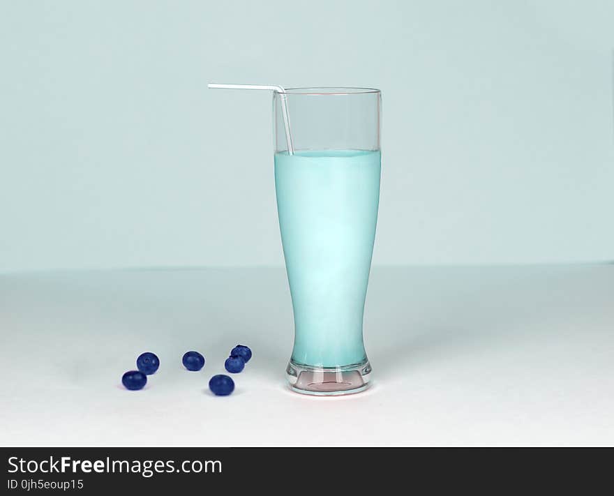 Glass of Milk Against White Background