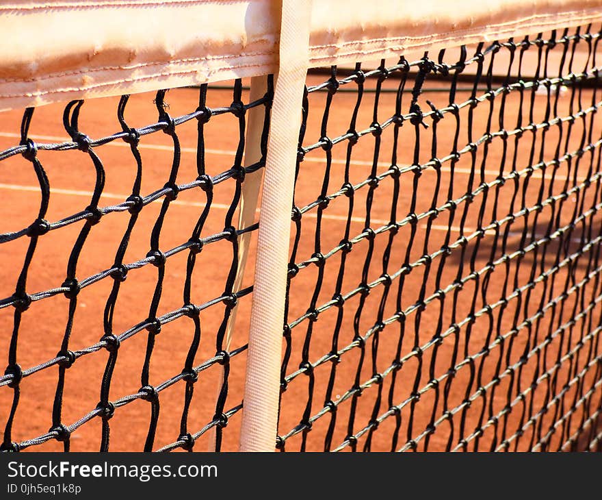 Close-up of Chainlink Fence Against Sky