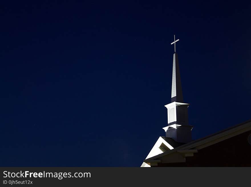 Low Angle View of Cross Against Sky at Night