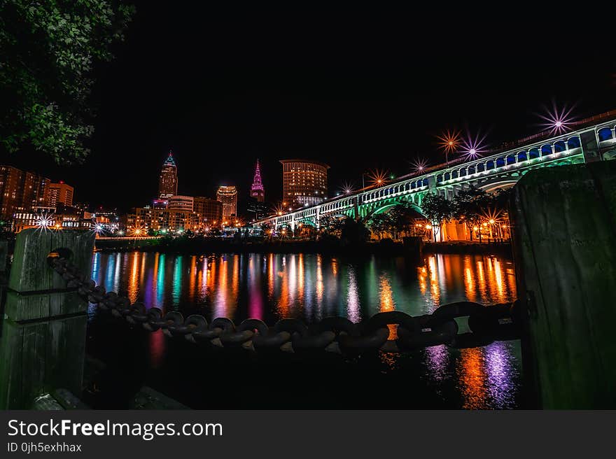 Reflection of Illuminated Buildings in Water at Night