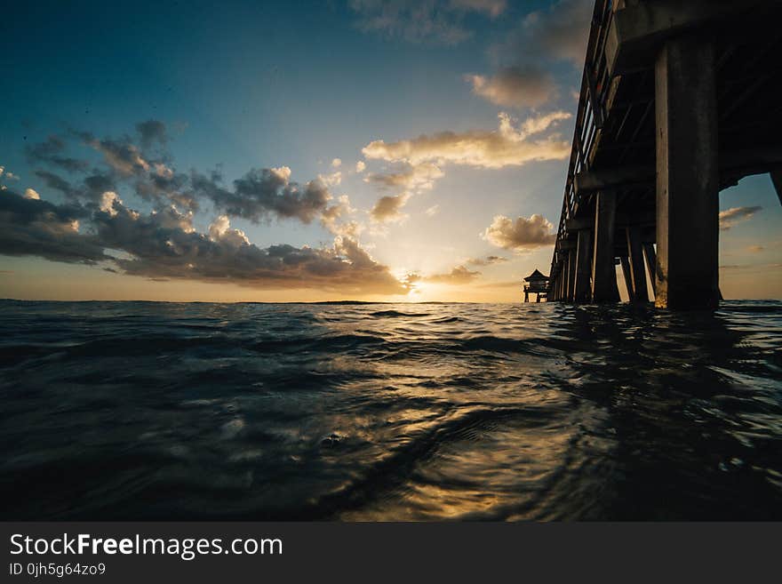 Scenic View of Sea Against Dramatic Sky