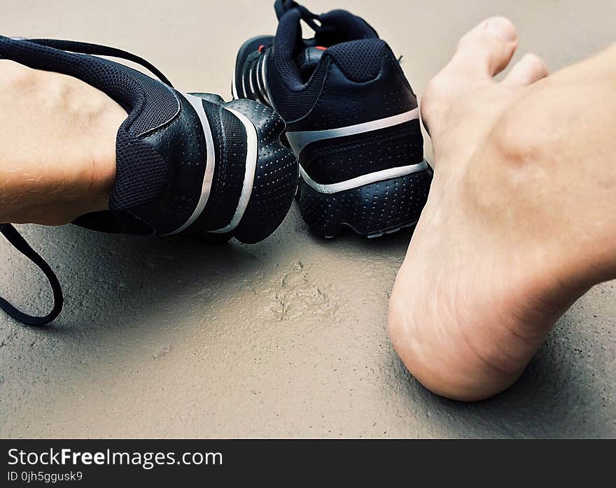 Close-up of Man Wearing Shoes