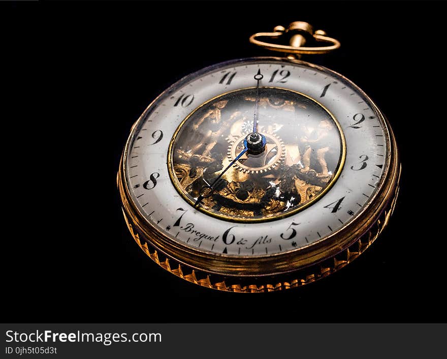 Round Gold-colored Pocket Watch