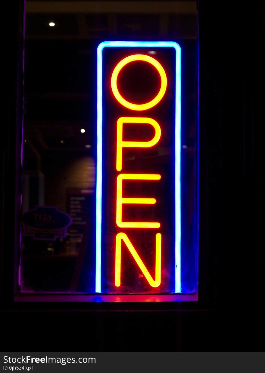 Information Sign in City at Night