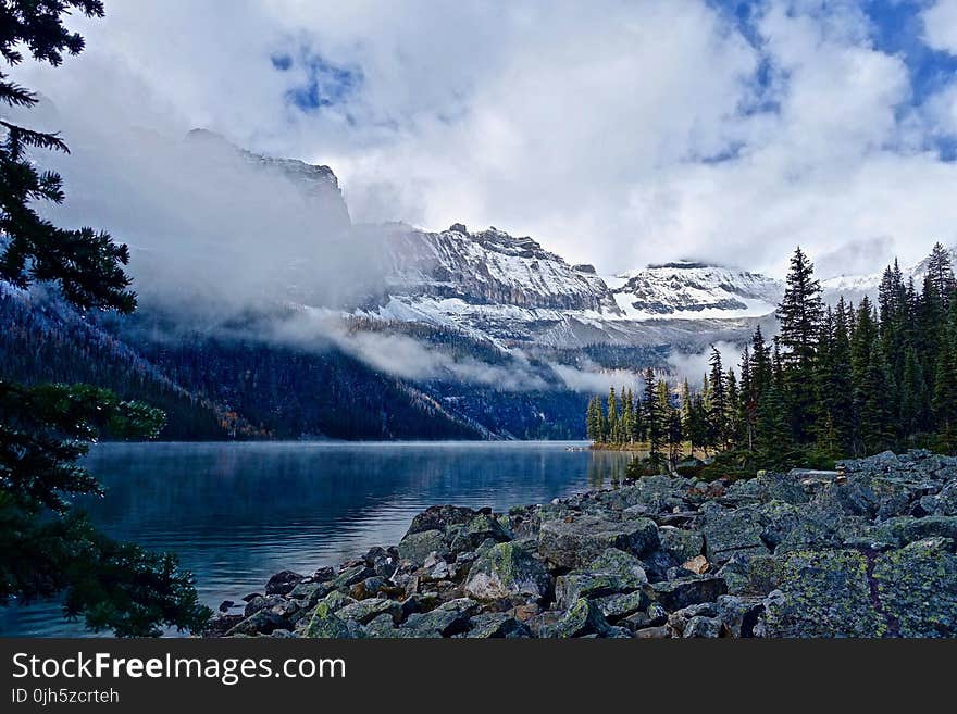 View of Lake With Mountain Range in the Background