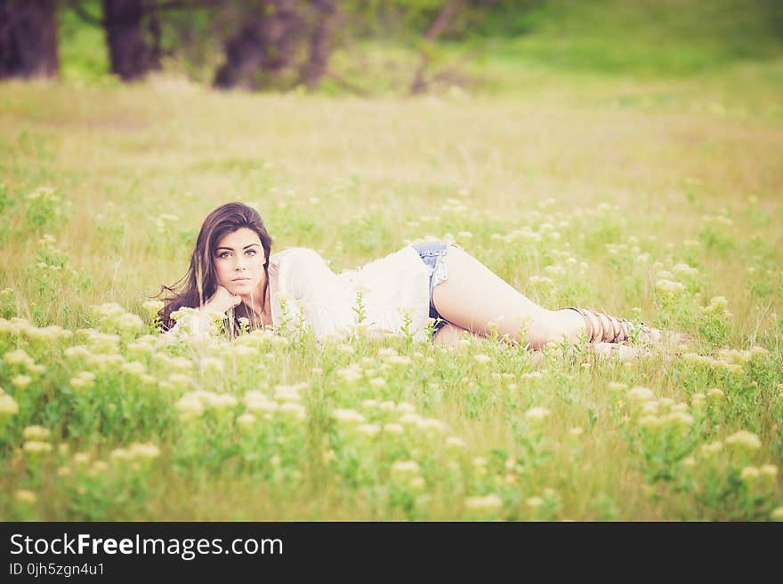 Woman Lying on Grass