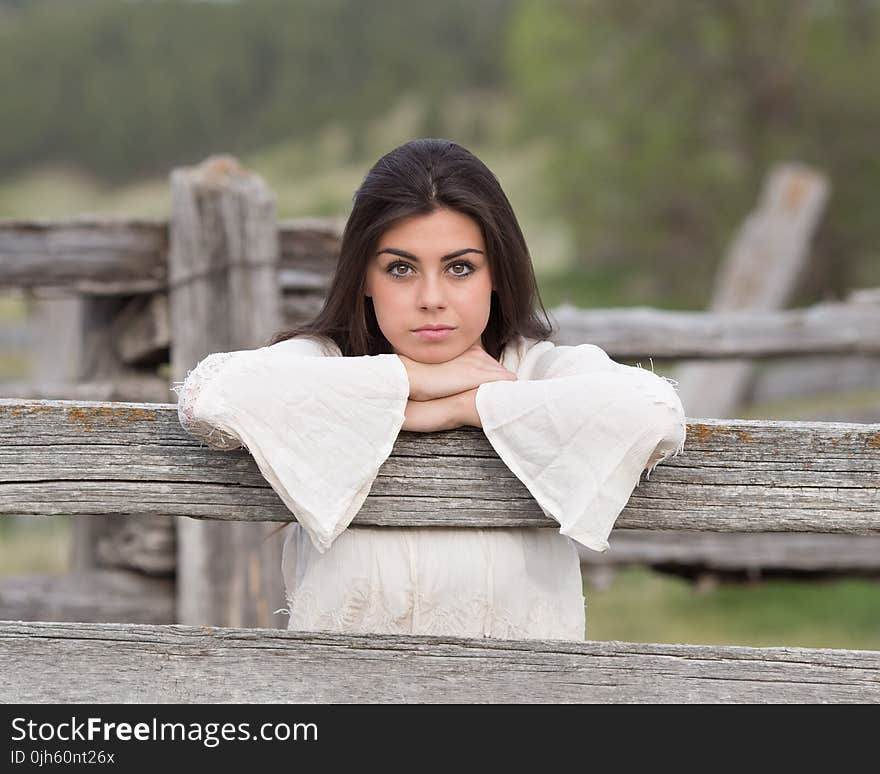 Portrait of Beautiful Woman in Park