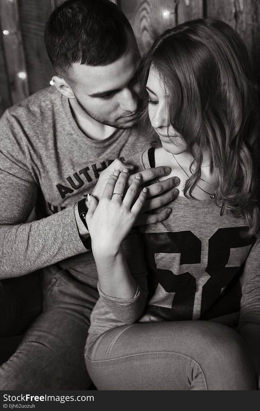 View of Couple Holding Hands