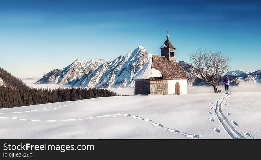 View of Snowcapped Mountain Against Blue Sky