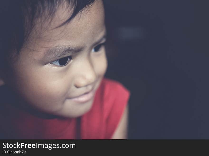 Closeup Photo of Toddler&#x27;s Wearing Red Tank Top