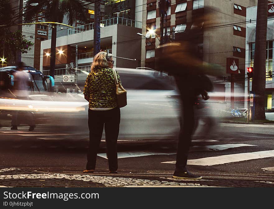 Time-lapse Photography Standing on Road