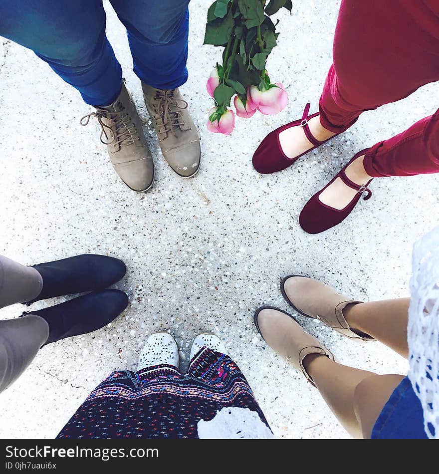 Five Person Wears Footwear at Daytime