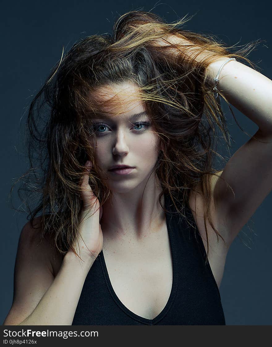 Photography of Woman Wearing Black Tank Top