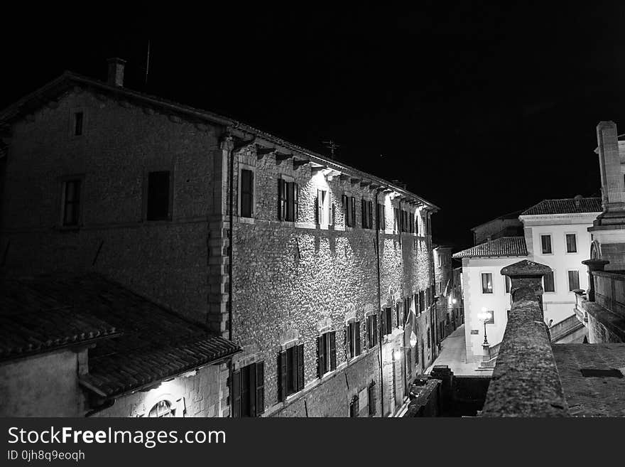 Monochrome Photo of Concrete Houses