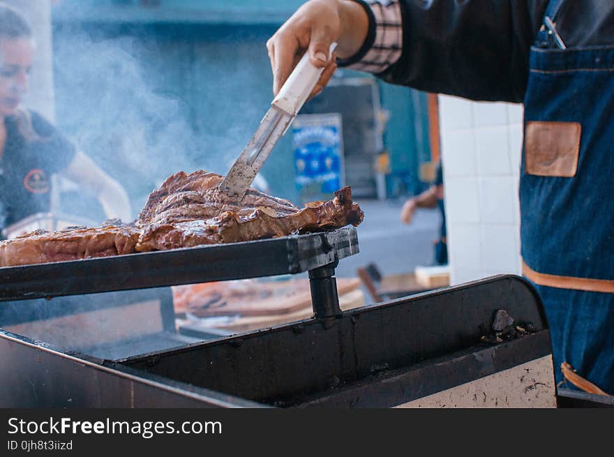 Man Cooking Beef