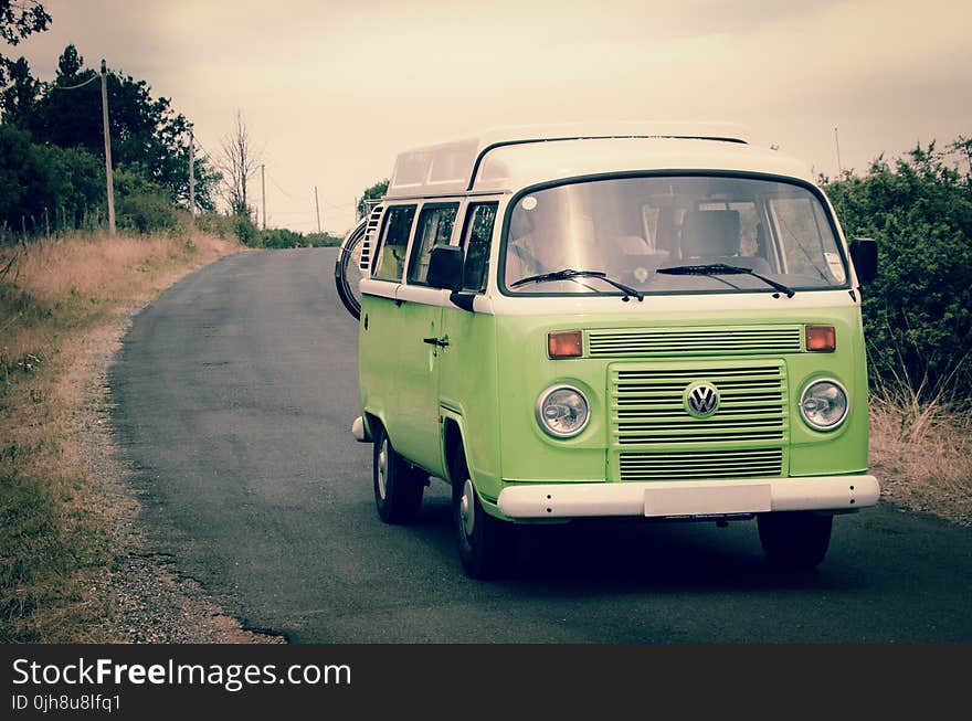 Green and White Volkswagen Combi