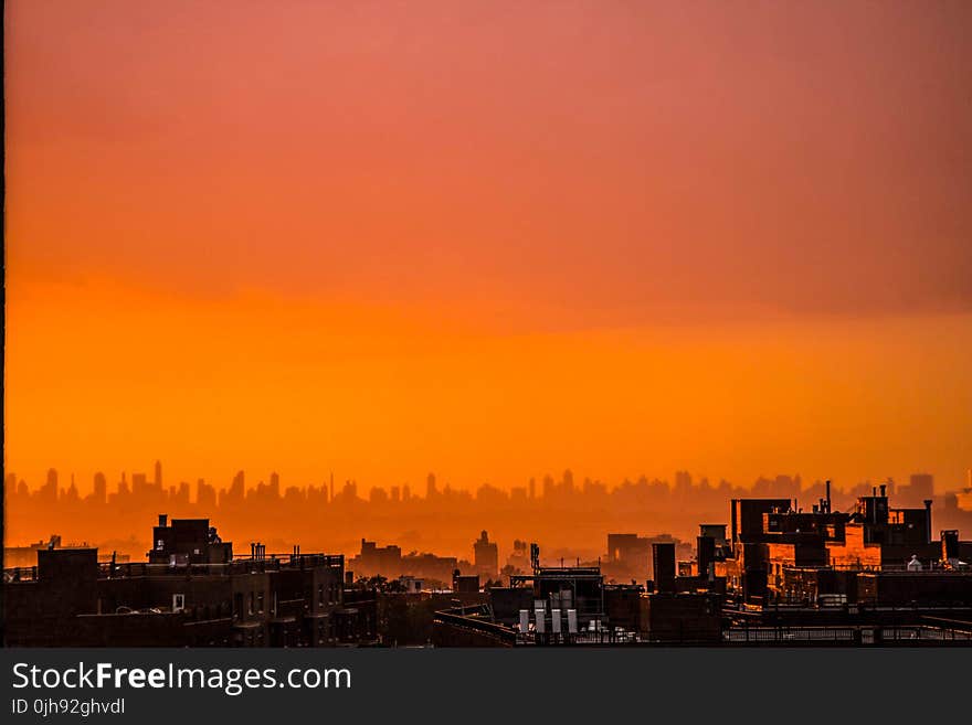 Photography of City During Sunset