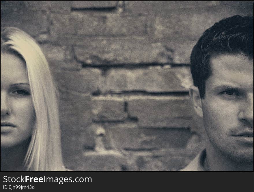 Grayscale Photo of Man and Woman