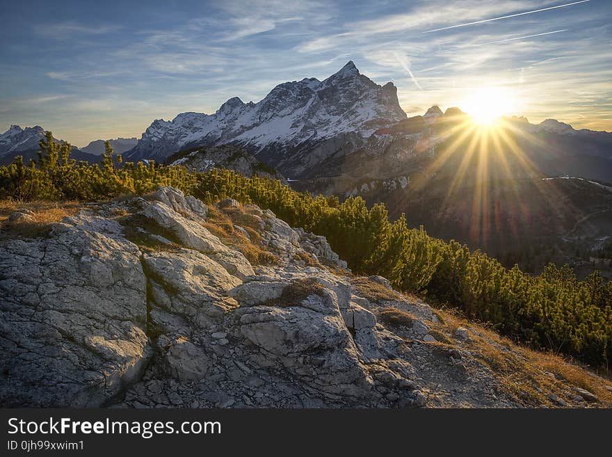 Snow Covered Mountain during Sunrise