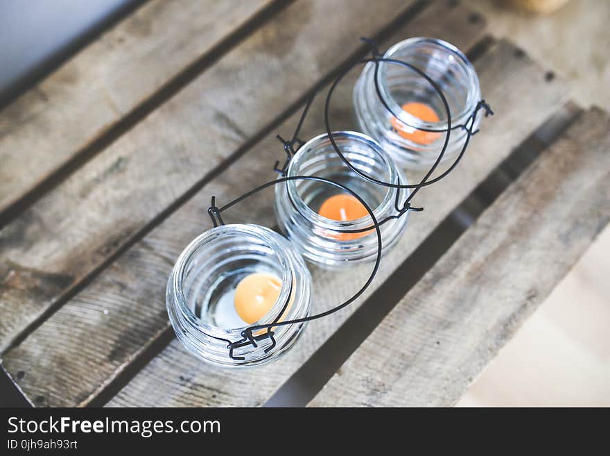 Three candleholders with tealights