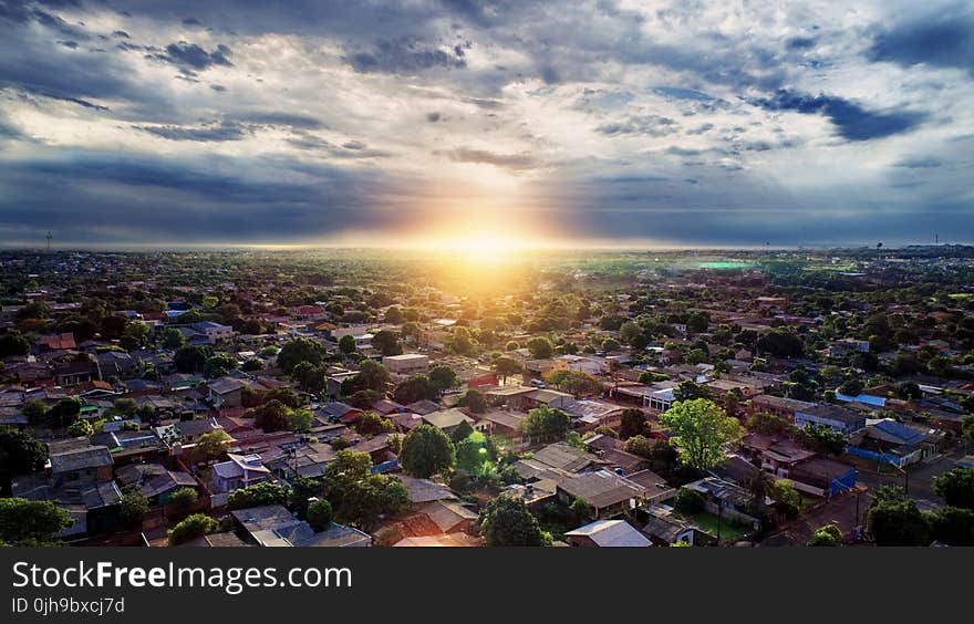 Aerial Photography of Buildings Under Blue and White Sky during Golden Hour