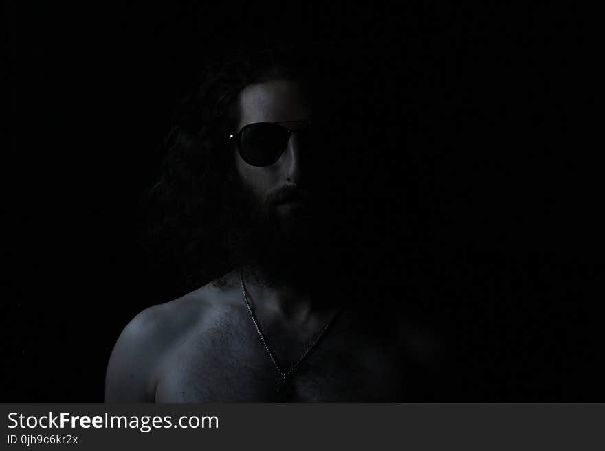 Grayscale Photography Of Topless Man Wearing Sunglasses