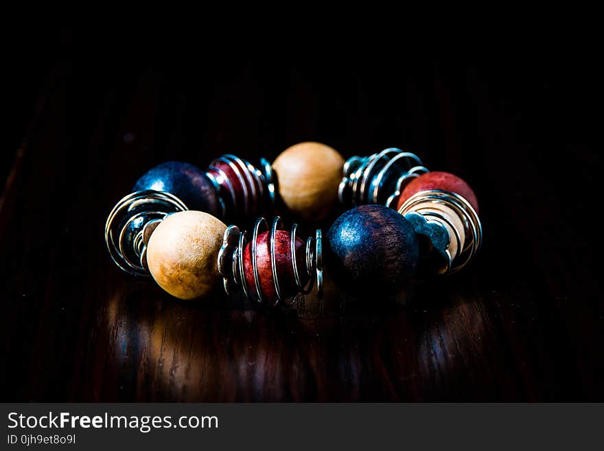 Blue, Red, Beige, and Silver Beaded Bracelet