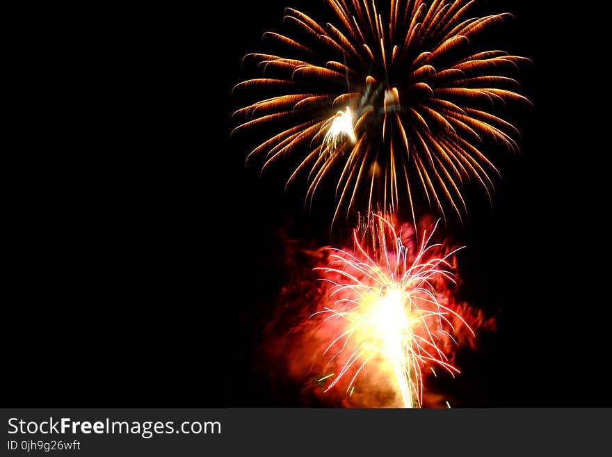 Red and Brown Fireworks Display Photo